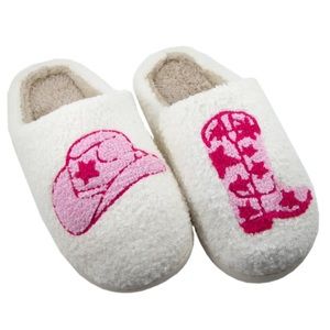 Brand new with tags. Pink and white Katydid cowgirl slippers. Size M/L.